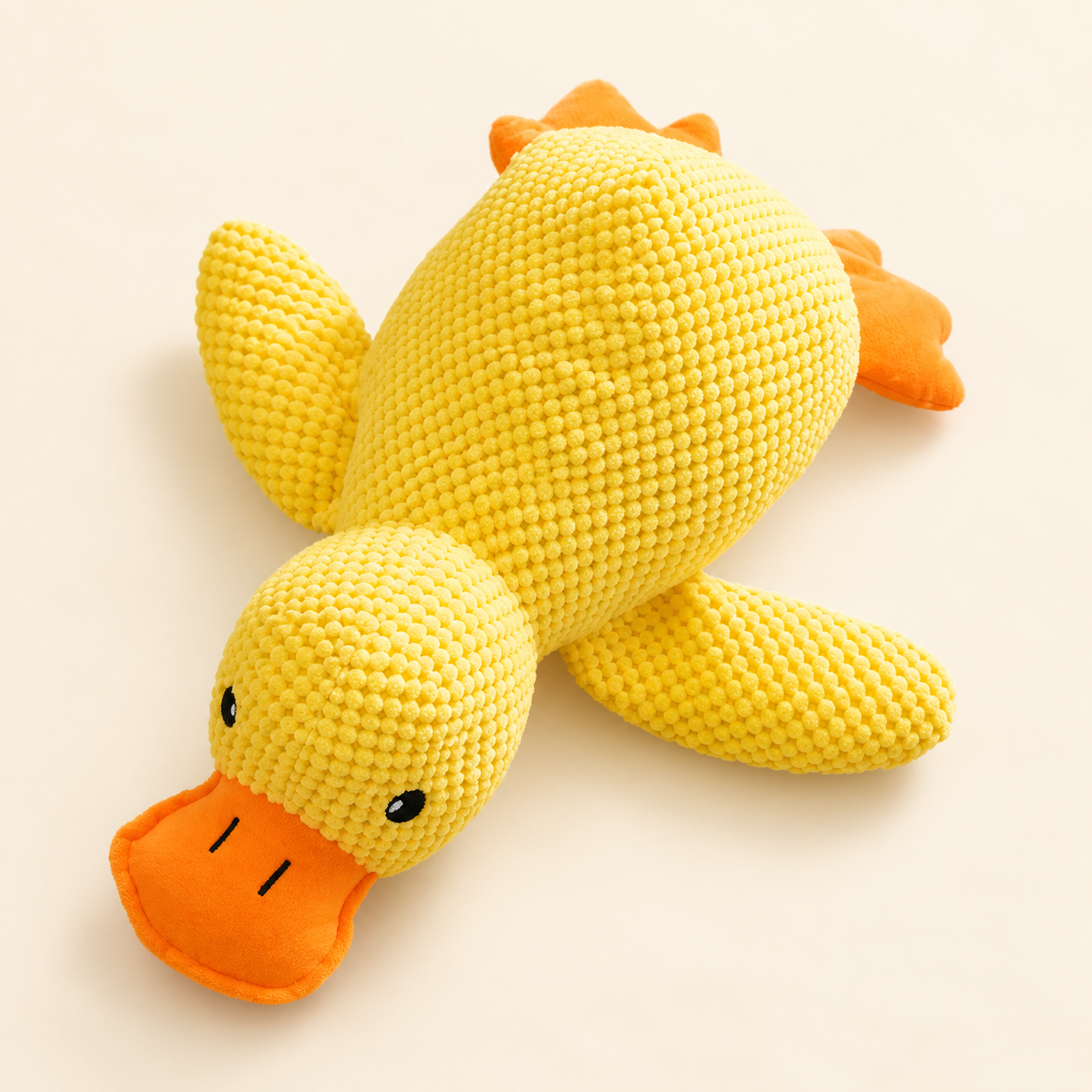 Close-up of the broad flat orange duck bill.